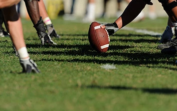 a group of people playing football