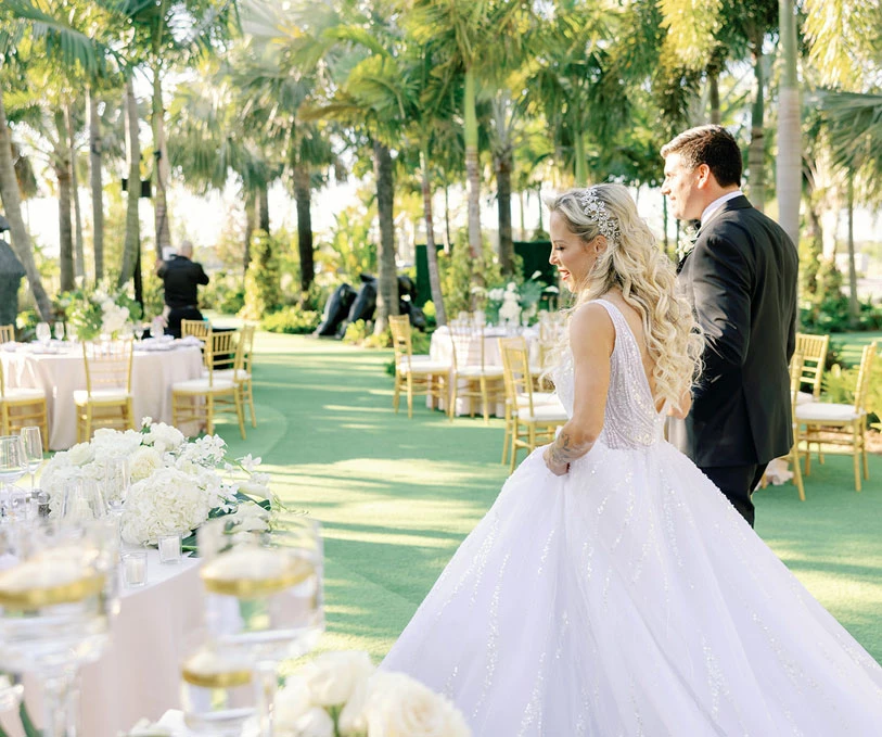 a man and woman in a white dress