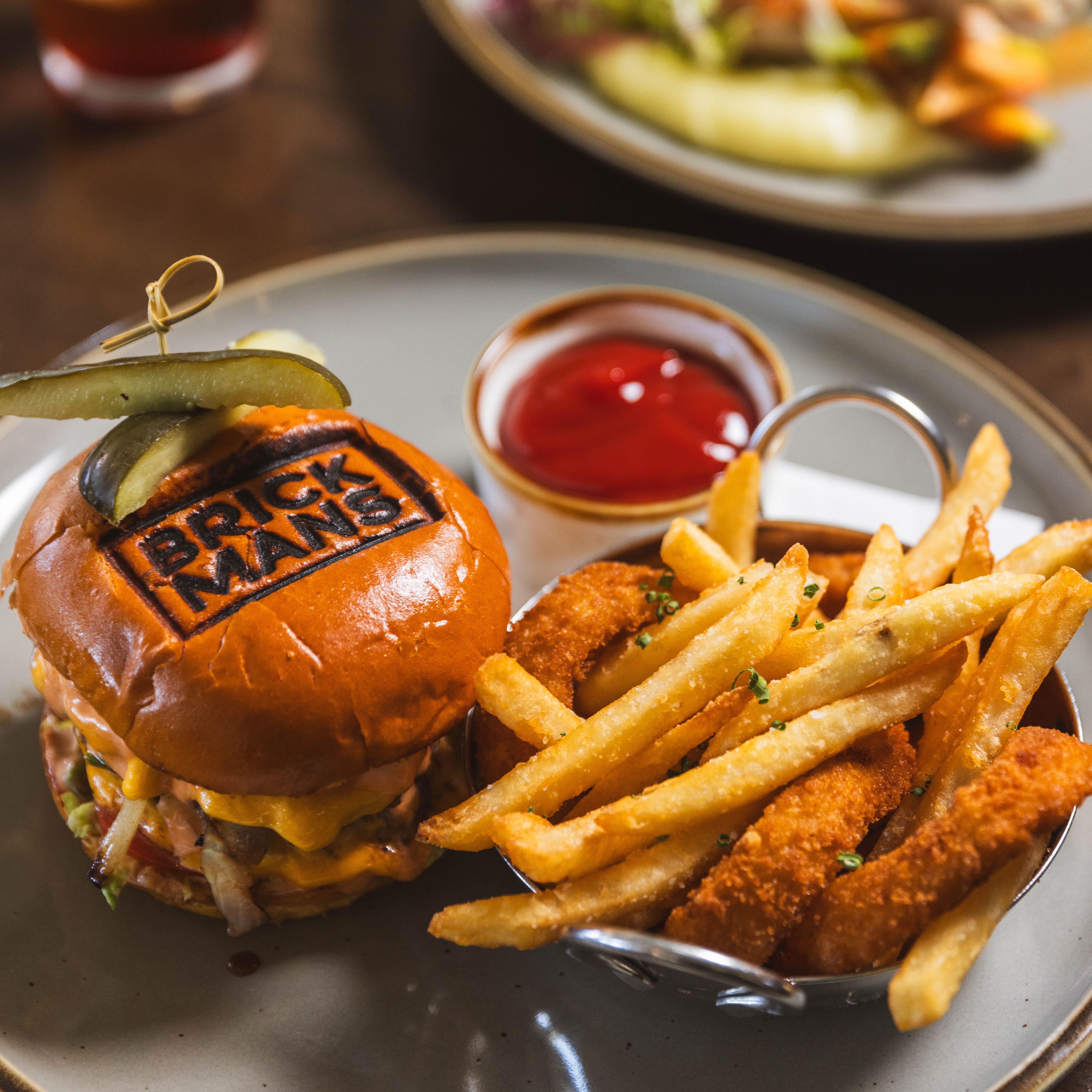 a plate of food with a burger and fries