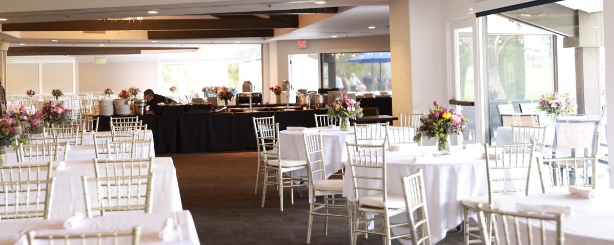 a room with tables and chairs