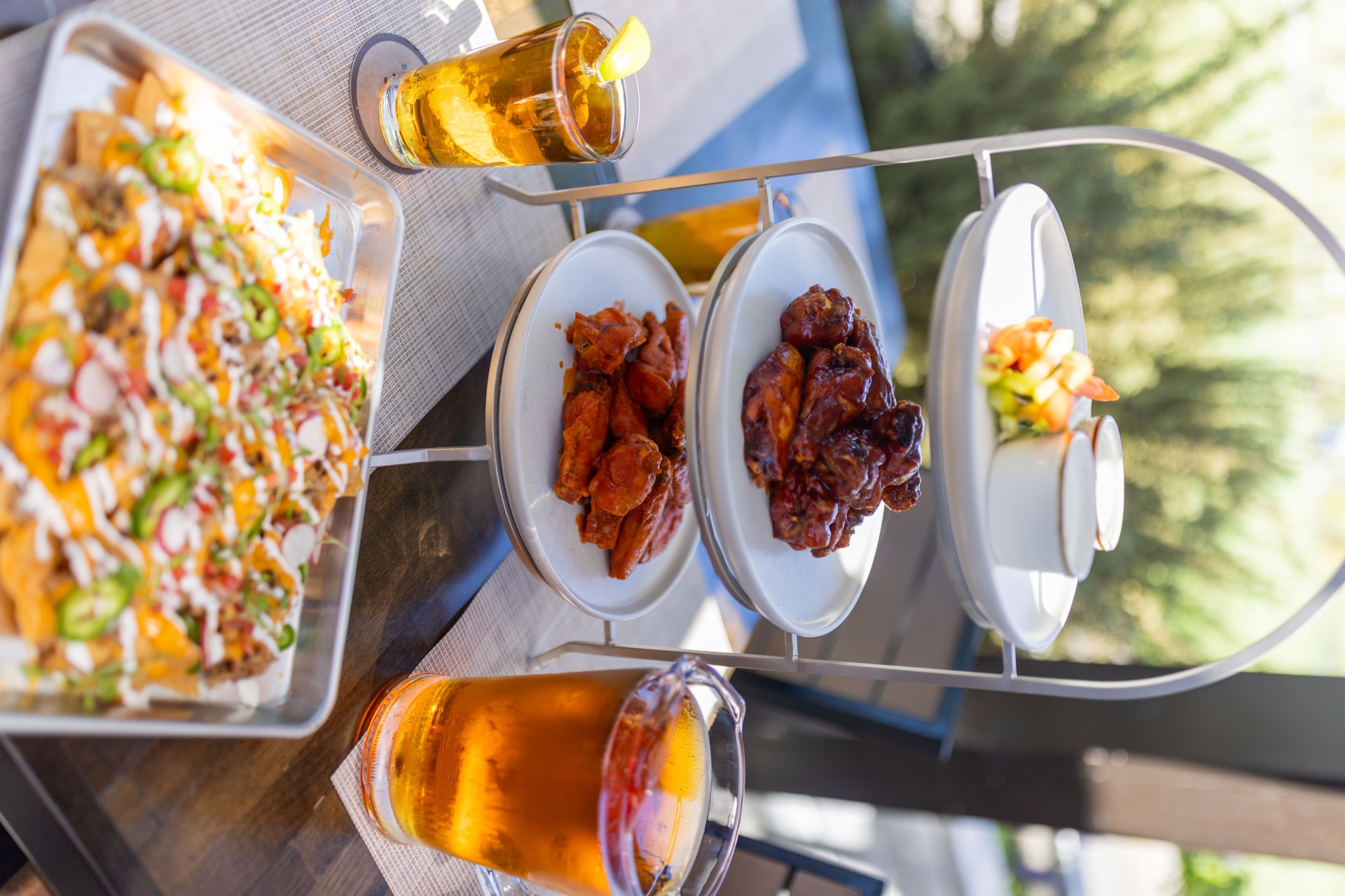 a table with plates of food and drinks