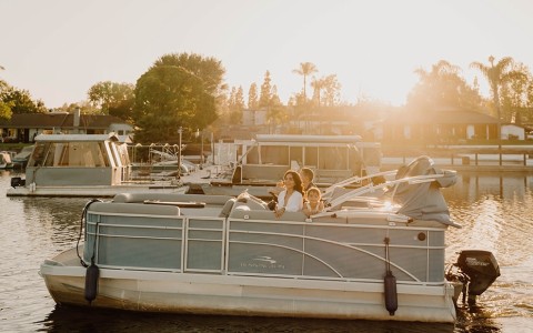 a group of people on a boat in a body of water
