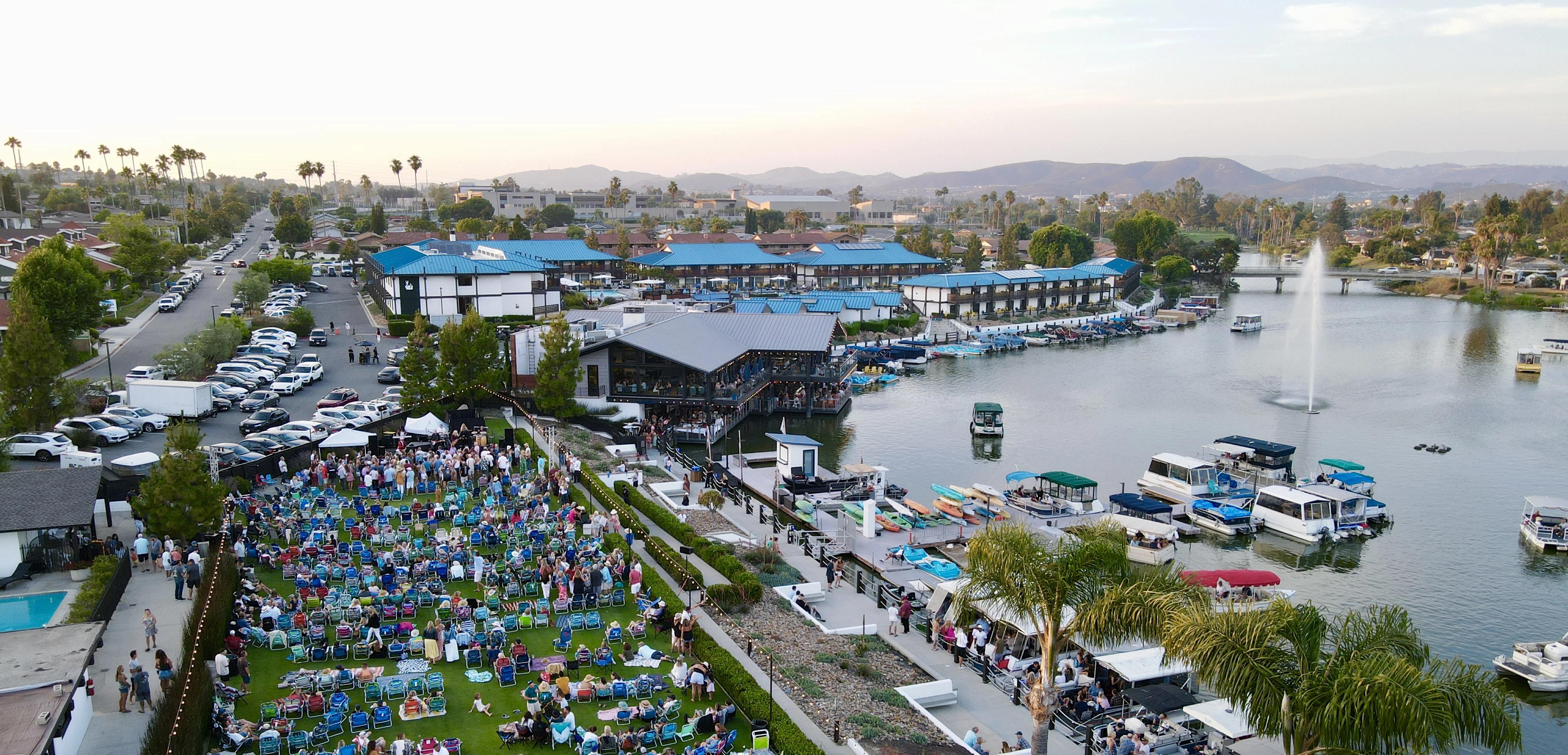 a body of water with boats and buildings along it