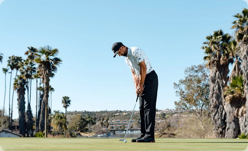 a person playing golf