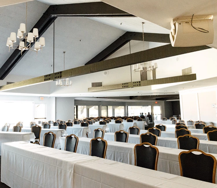 a room with tables and chairs
