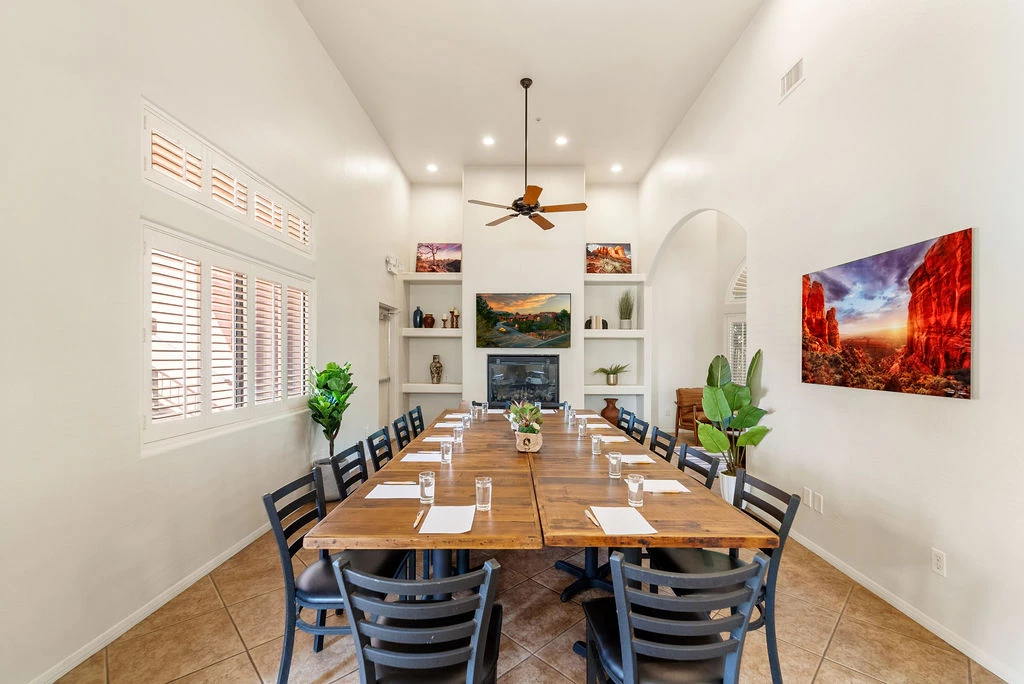 a room with a table and chairs