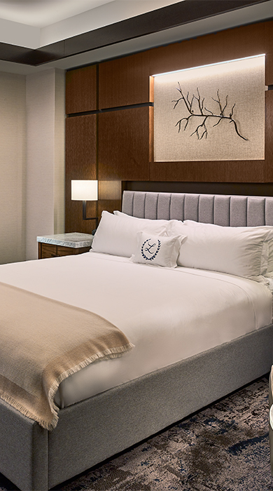 a bed with white sheets