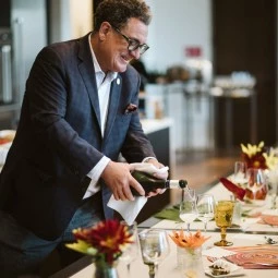master sommelier pouring wine