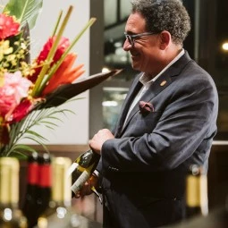 the master sommelier presenting wine