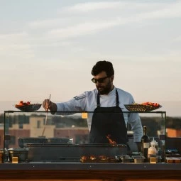 chefs preparing food on the rooftop