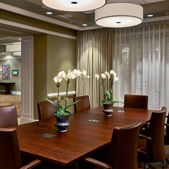 a room with a table and chairs preview