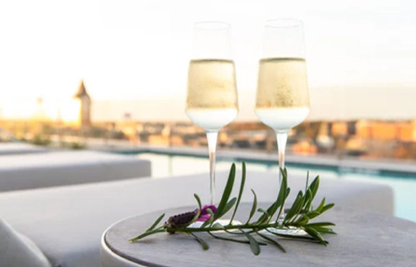 two glasses of champagne on a table
