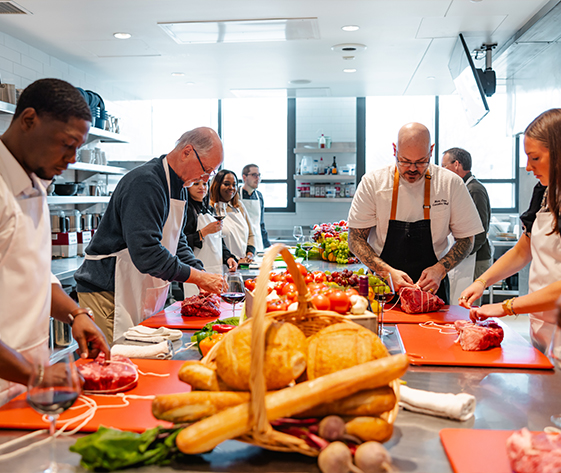 a group of people in a kitchen