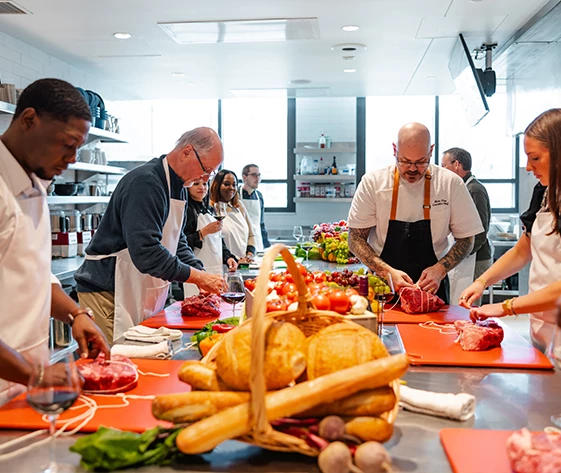 a group of people in a kitchen