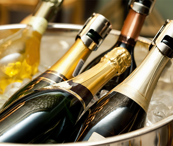 a group of champagne bottles in a bucket