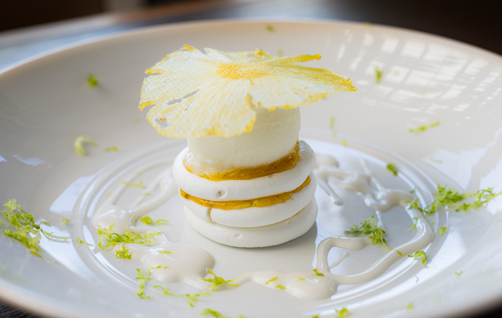 a plate of food with a pineapple on top