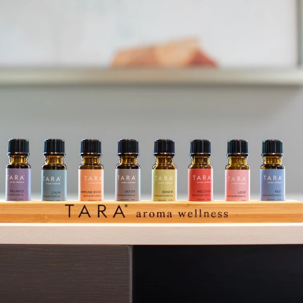 a row of small bottles on a wooden shelf preview