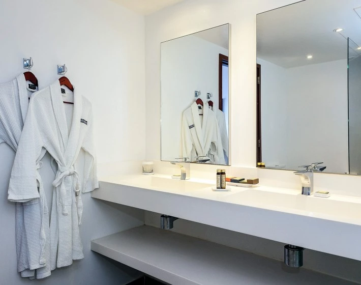 a bathroom with a large mirror