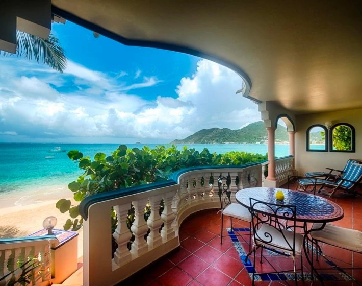 a balcony overlooking the ocean