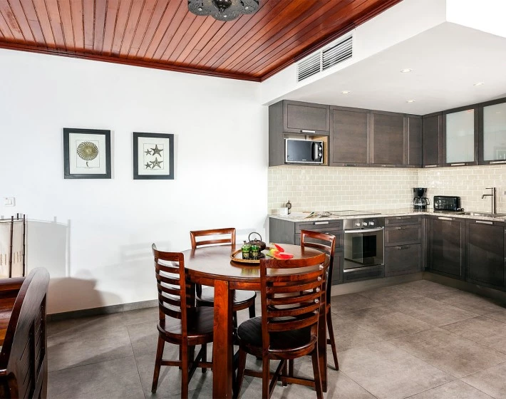 a kitchen with a dining table