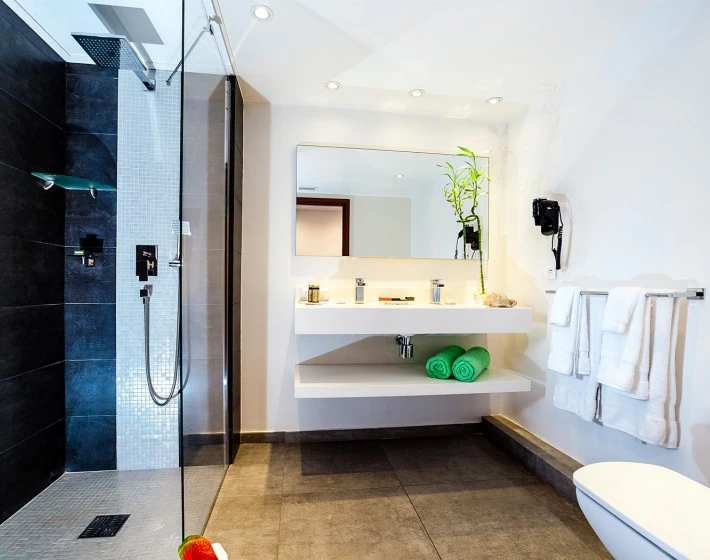 a bathroom with a tub sink and toilet