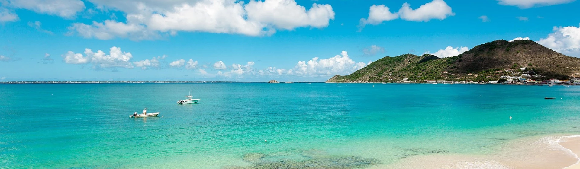 An view of the beach near the Le Petit Hotel