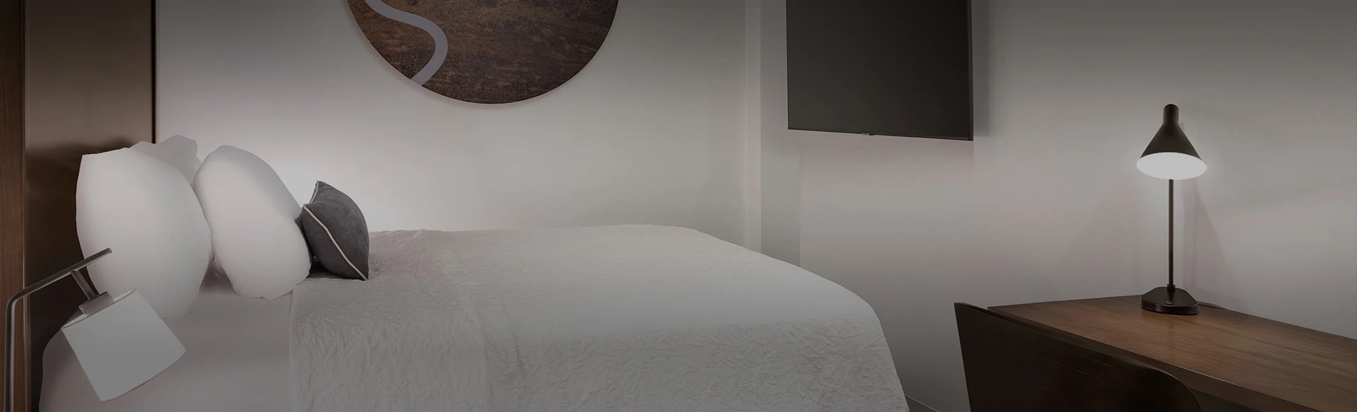 hotel room bed with lamp