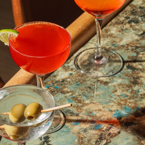 a group of drinks on a counter