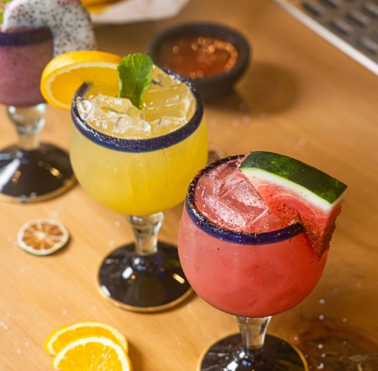 a group of drinks on a table