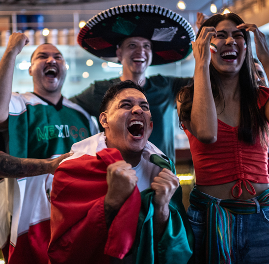 a group of people cheering