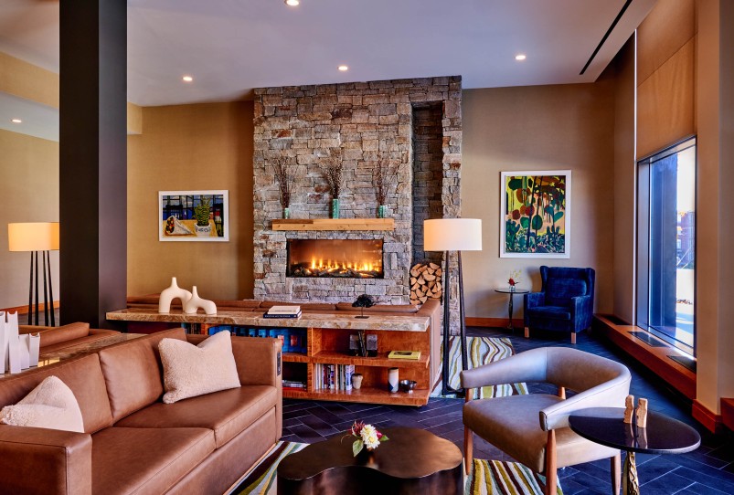 lobby with a fireplace and couches