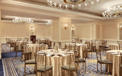 a room with tables and chairs