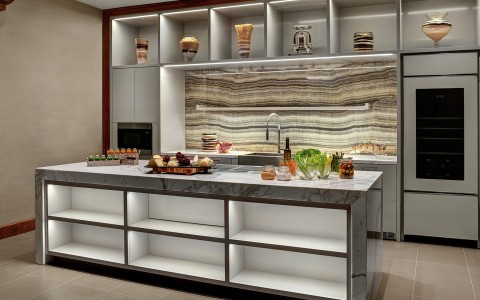 a kitchen with a marble countertop