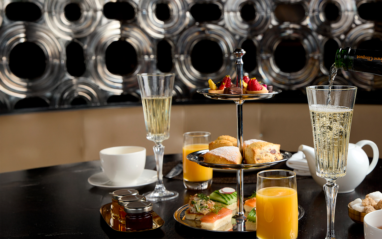 a tray of food and drinks on a table