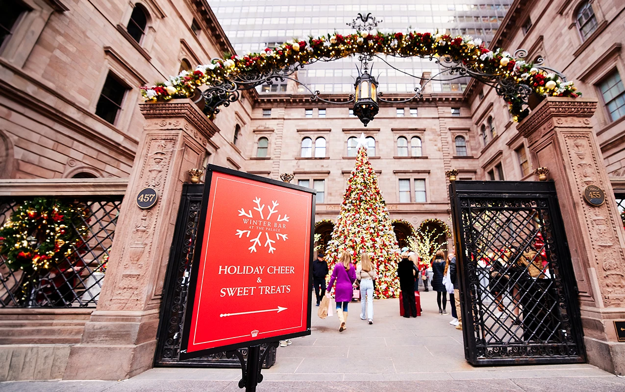 a sign in front of a building