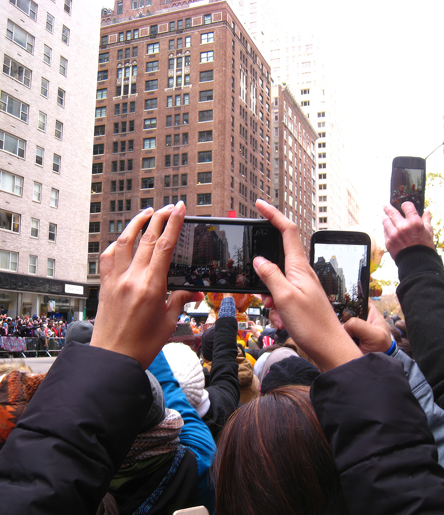 a group of people holding phones