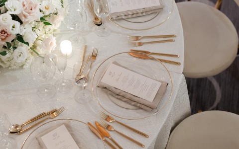 a table with plates and cutlery
