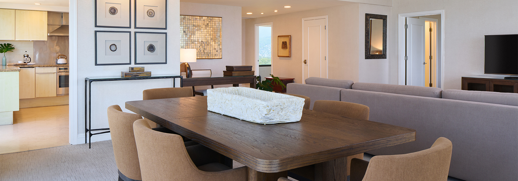 a white rectangular object on a table in a living room