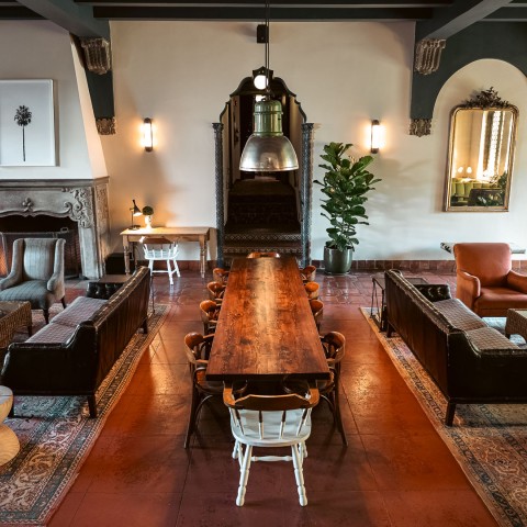 a room with a table and chairs