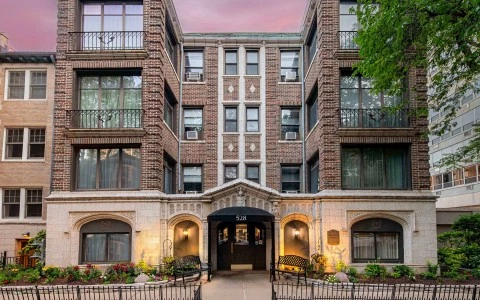 a building with a door and a gate