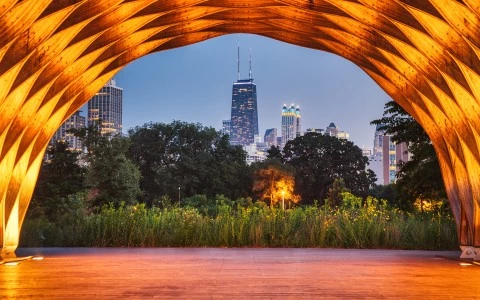 a wood deck with a city skyline in the background