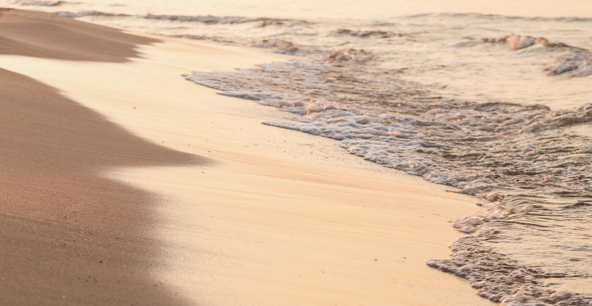 a person walking on a beach
