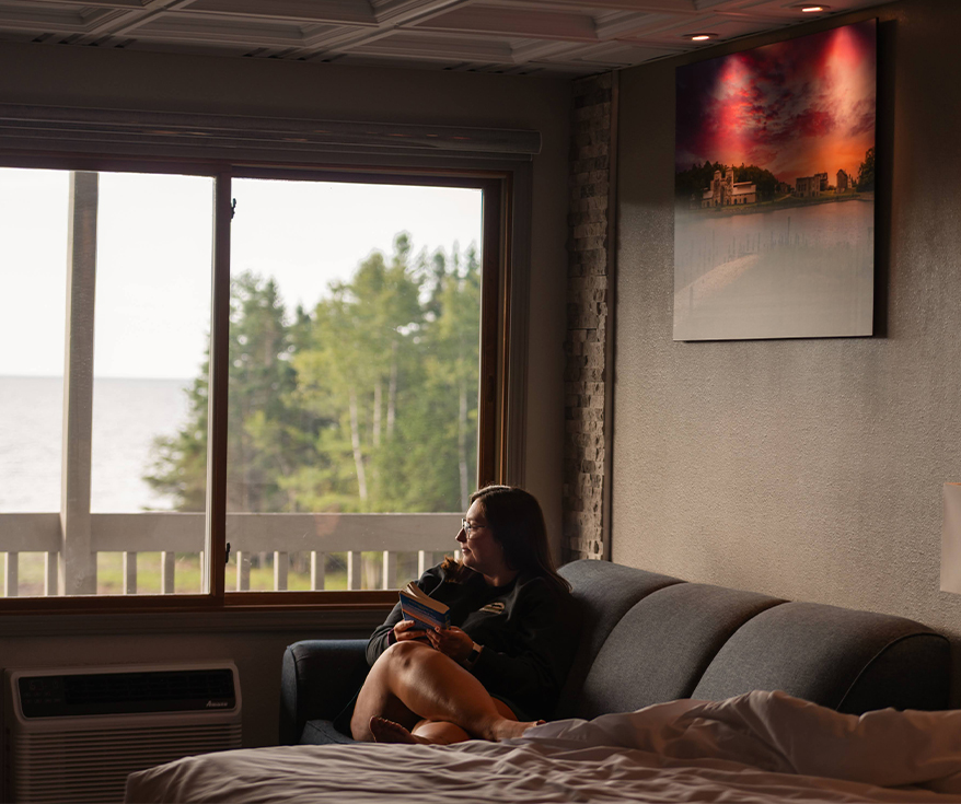 a woman sitting on a couch