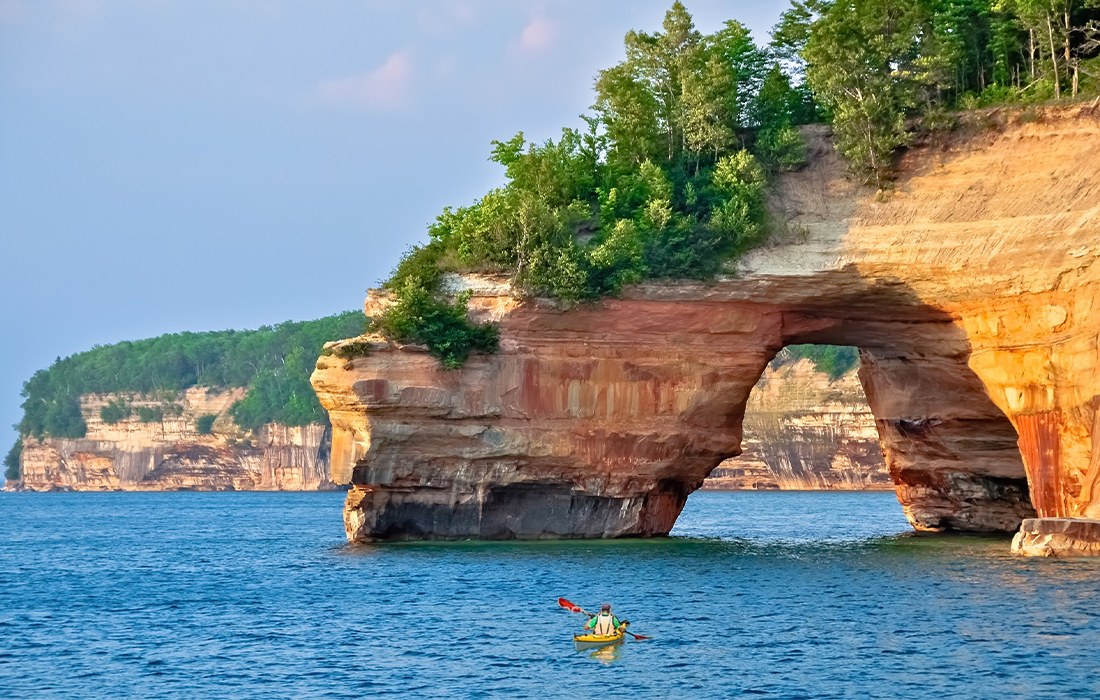 a person in a boat on the water