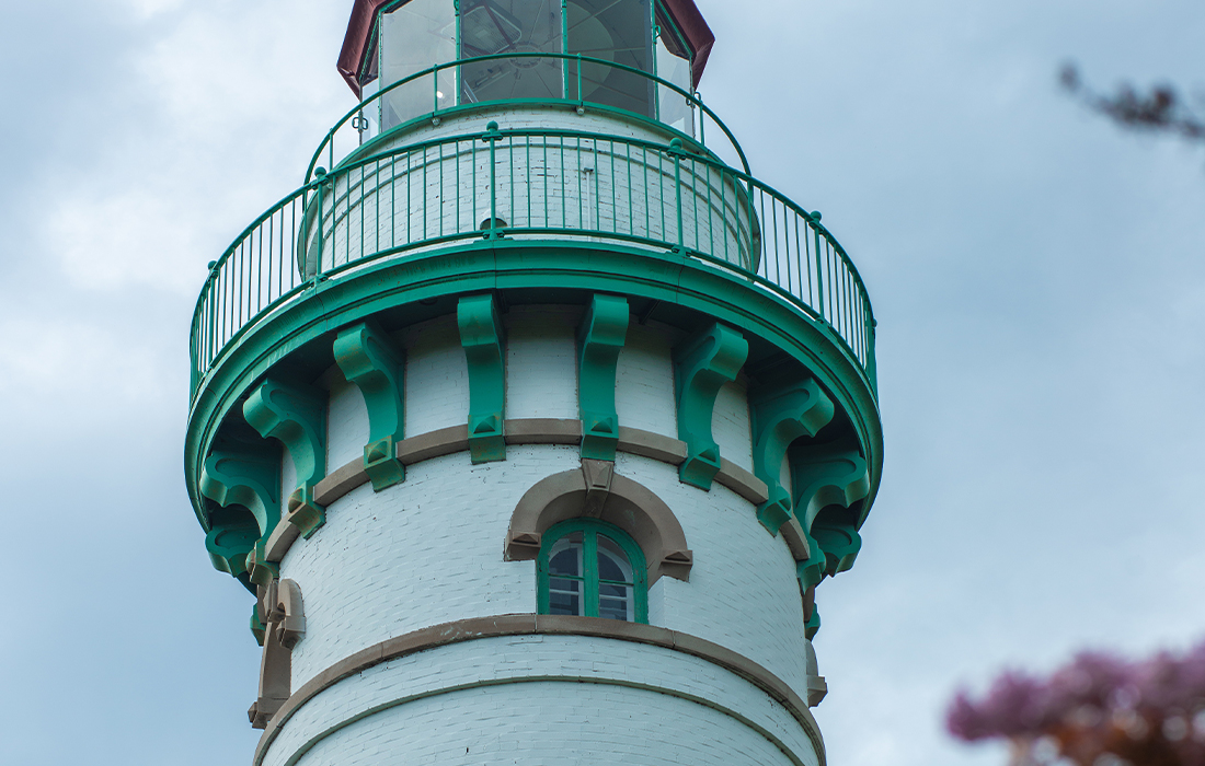a lighthouse with a balcony