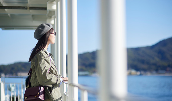 a woman looking out of a window
