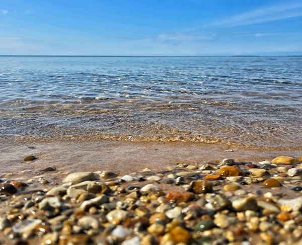 a beach with rocks and water