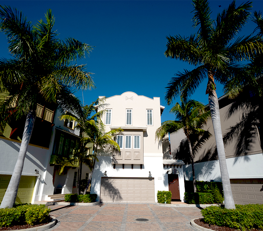 a building with palm trees