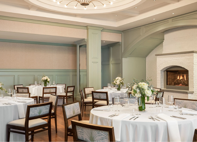 a room with tables and chairs