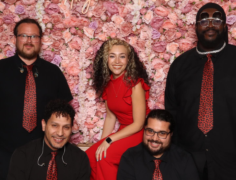 a group of people posing for a photo